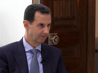 Асад после внезапного недомогания возобновил речь в парламенте