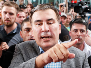 Саакашвили поймали и отправили в тюрьму