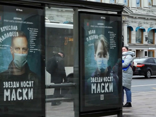 Коронавирус в России: маски снимем, когда привьемся