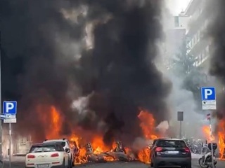 После взрыва в центре Милана начался пожар
