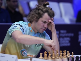 Магнус Карлсен выиграл чемпионат мира по скоростным шахматам