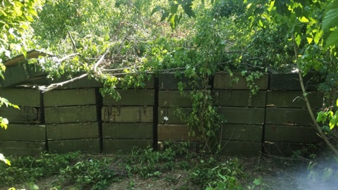 В схроне под Токмаком нашли 260 ящиков со снарядами