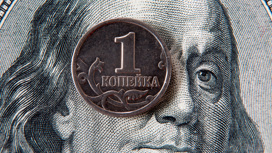 Доллар упал ниже 60 рублей