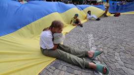 Возмущенные украинцы покидают Германию