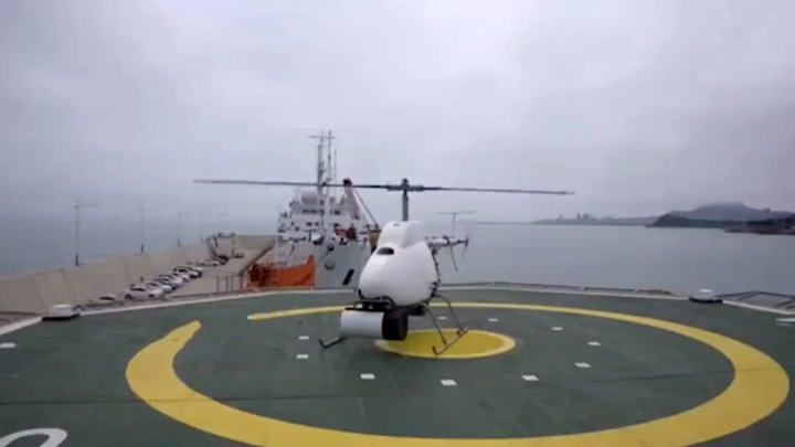 Китайский беспилотный вертолет успешно испытали на море